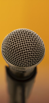 Microphone on a warm yellow background